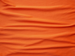 orange silk cloth background,sportswear shirt texture