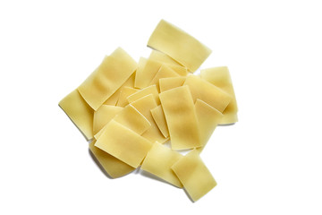 Noodles. Ingredient for cooking beshbarmak. Isolated on white background. Top view