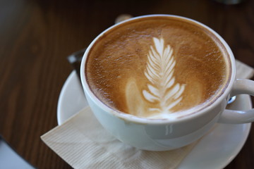 hot latte coffee in cafe