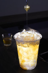 close up of iced honey lemon soda in cafe
