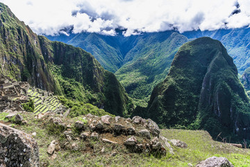 Fototapeta na wymiar The stones on the slopes of Machu Picchu