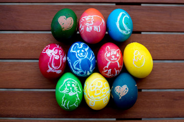 Colorful easter eggs with children drawings