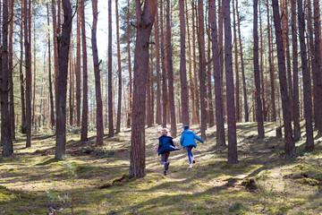 Fototapeta premium Two girls in the forest