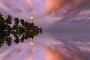 White lighthouse Dondra Head and tropical palms, Sri Lanka, near Matara.