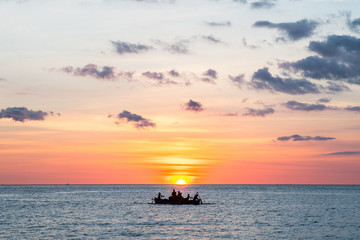 fishing boat during sunset