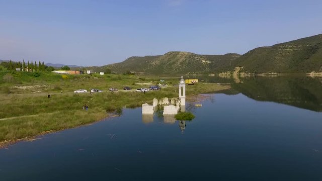 Abandoned old church immersed under reservoir water in Cyprus