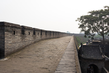 Pingyao, Shanxi province, China: walking on the ancient walls protecting the Old city of Pingyao, the most well preserved of all of China. UNESCO World Heritage Site © giusparta