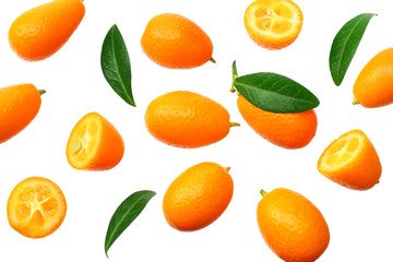Cumquat or kumquat with leaves isolated on white background. top view