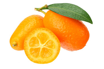 Cumquat or kumquat with slices and leaves isolated on white background