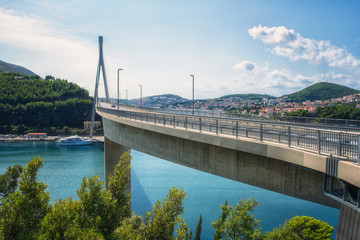 Franjo Tudjman bridge in Dubrovnik, part of the Adriatic highway E65 (Jadranska magistrala). Scenic daytime landscape, travel background