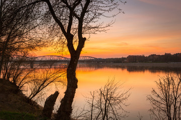Fototapeta na wymiar Amazing sunset over Vistula river in Torun, Poland