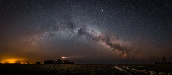 Foto op Aluminium Beacons under the starry night sky © Magnus