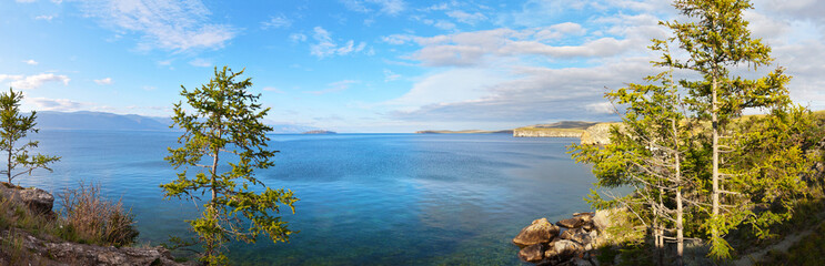 Baikal Lake in summer. Panoramic view from the shore of the Olkhon Island to the Small Sea Strait (Maloe More). Beautiful summer landscape