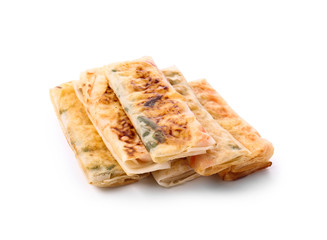 Tasty fried spring rolls on white background