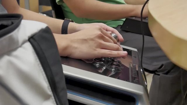 A video where someone is playing and using a Gaming Console