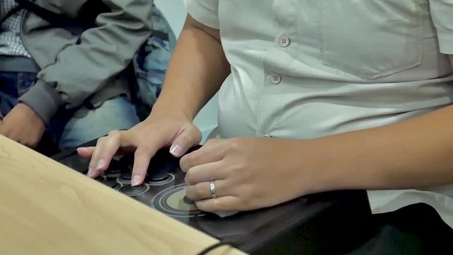 A video where someone is playing and using a Gaming Console