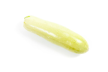 Fresh green zucchini on white background.