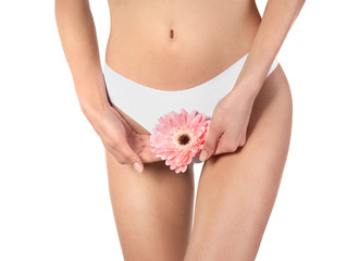 Beautiful young woman with flower on white background. Epilation concept