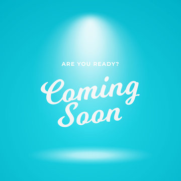 Coming soon poster background vector design. Light blue backdrop with bright spotlight and calligraphy text illustration.