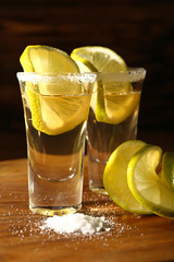 Shots of tequila on table