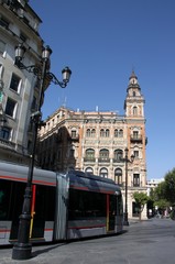 Fototapeta na wymiar Seville light metro on the city street