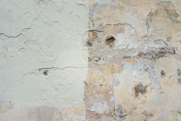 Old Wall With Peel Grey Stucco Texture. Retro Vintage Worn Wall Background. Decayed Cracked Rough Abstract Banner Surface.