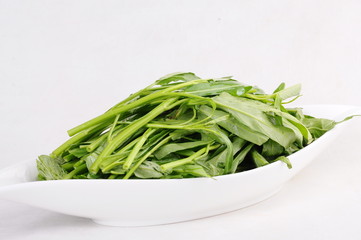 green beans in a bowl isolated on white