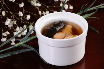 cup of coffee and cookies on white background