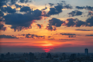 Obraz premium Ekaterinburg, Russia - Jule, 2018: Panoramic shot of cityscape view megalopolis after sunset with beutiful clouds