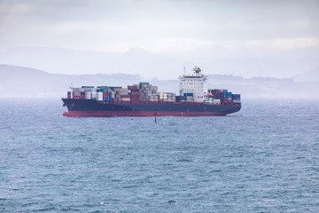 a container ship at the sea