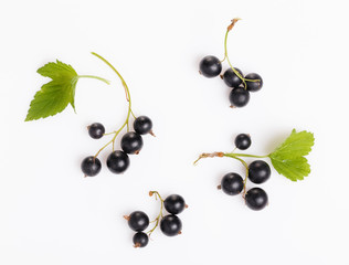 Fresh blueberries, red and black currants, gooseberries, summer berry ornament on a white background