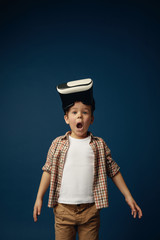 Child with virtual reality headset