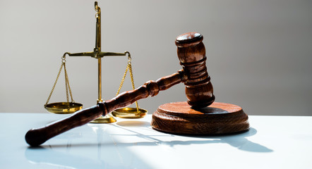  judge's wooden gavel on blurred background
