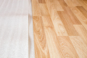 Laminate, the structure of wood, wooden boards and insulating substrate