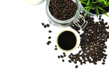 coffee bean and hot coffee in paper glass