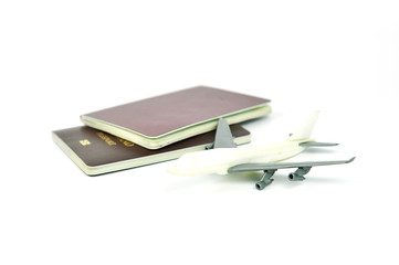 passport and toy airplane. travel concept