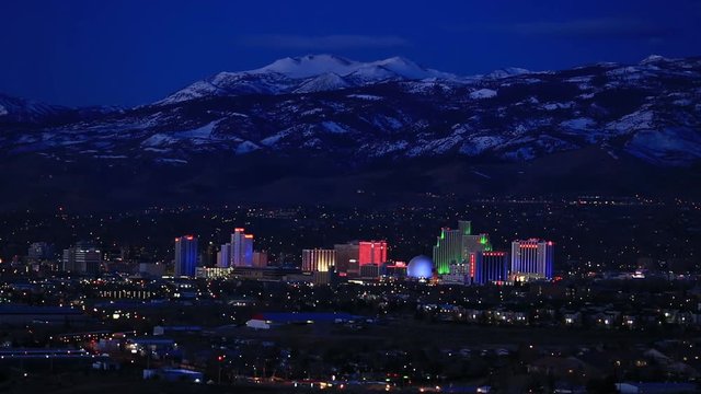 Downtown Reno Nevada lit up before sunrise