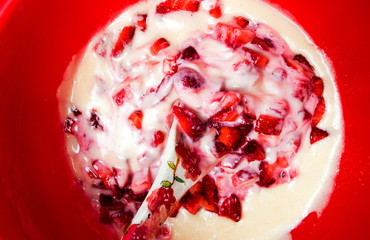 Strawberries in a container for making a cream