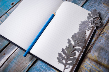 Blank notepad and  pencil