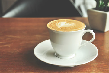coffee cup on the wooden table