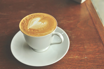 coffee cup on the wooden table