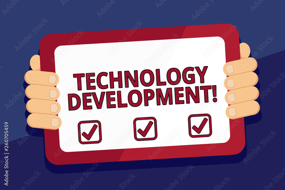Wall mural writing note showing technology development. business concept for anything in regards to inventions 