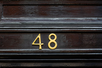 Obraz premium House door number 48 or forty-eight