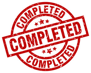 completed round red grunge stamp