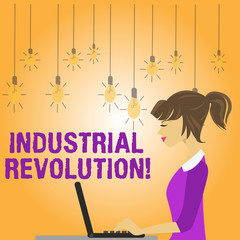 Writing note showing Industrial Revolution. Business concept for time during which work done more by machines photo of Young Busy Woman Sitting Side View and Working on her Laptop