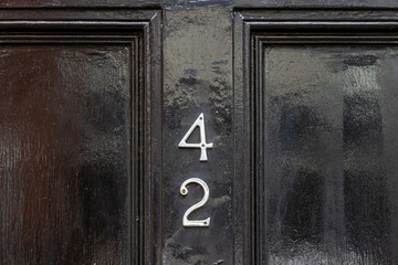 House number 42 with the forty-two in silver metal