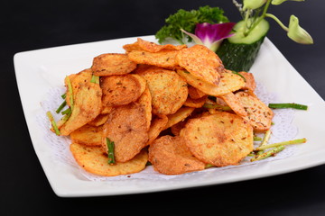 fried chicken with vegetables on white plate