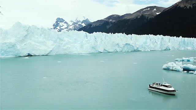 Tourists on Boat and Perito Moreno Glacier, Parque Nacional Los Glaciares (World Heritage Area), Patagonia, Argentina, South America.  