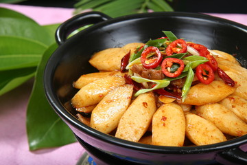 fried potatoes with meat and vegetables