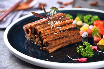 grilled steak with sauce and vegetables